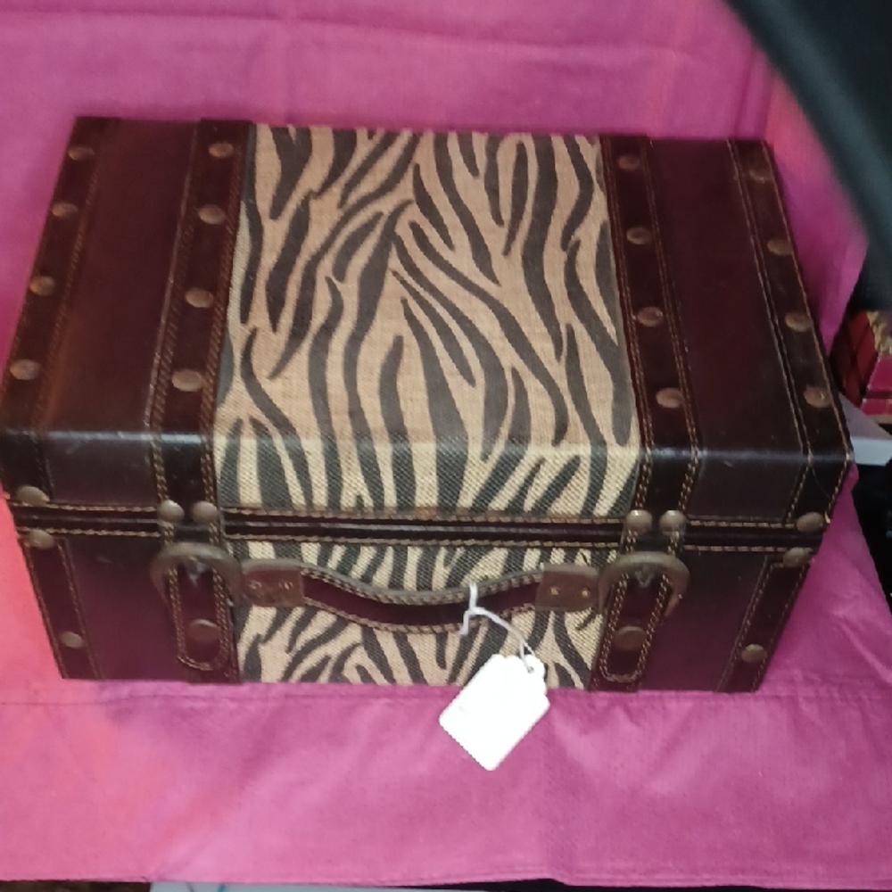 Zebra Print Traveler Trunk with Leather Accents.